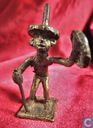 Bronze Asante gold weight - man with stick and gold strainer