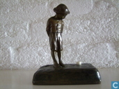 bronze boy with hat and bare feet