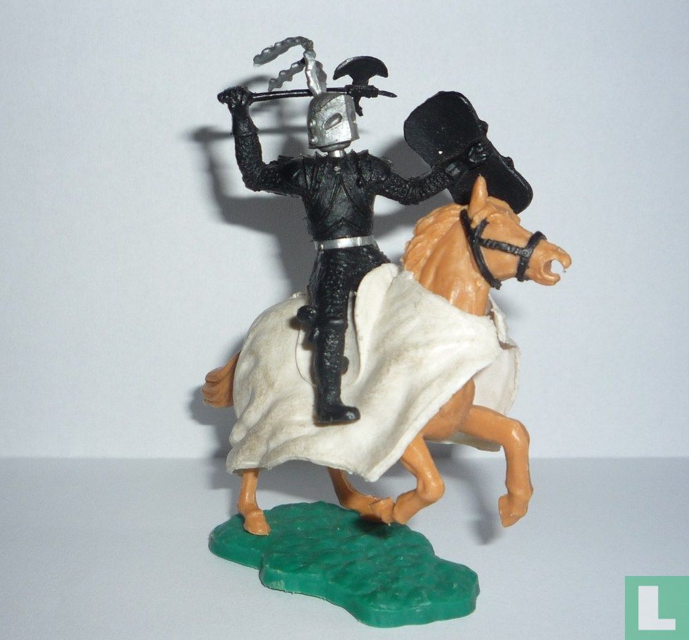 Chevalier noir à cheval
