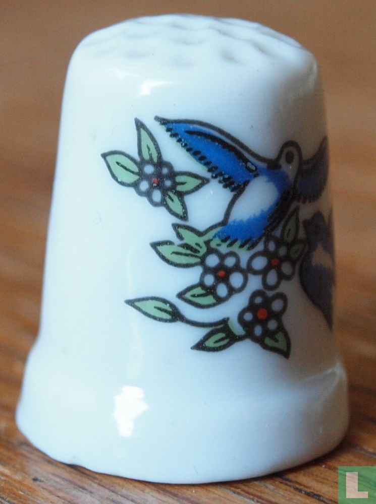 [Blauwe vogels in de lucht]