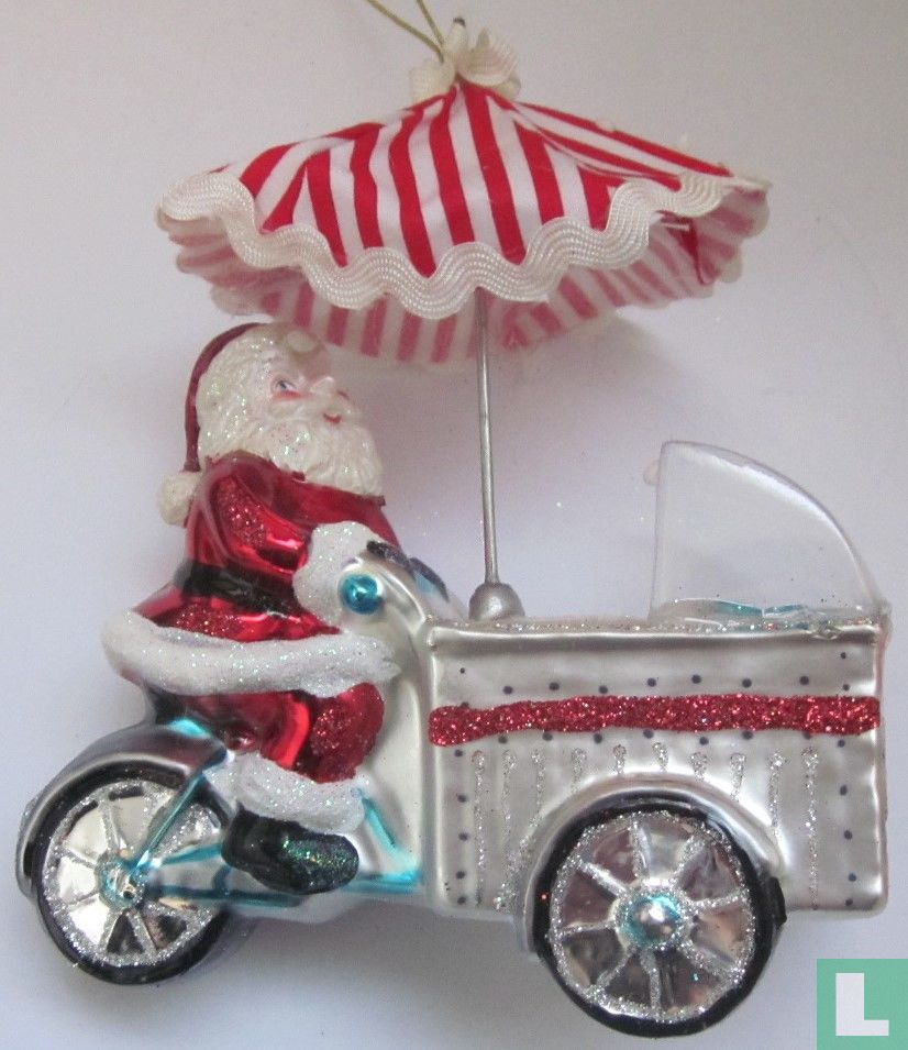Kerstman op ijscokar