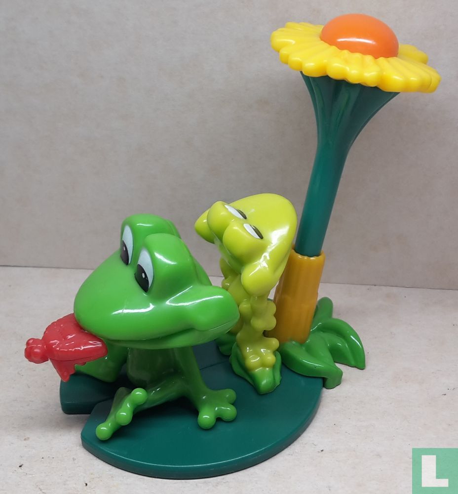 Grenouille avec fleur