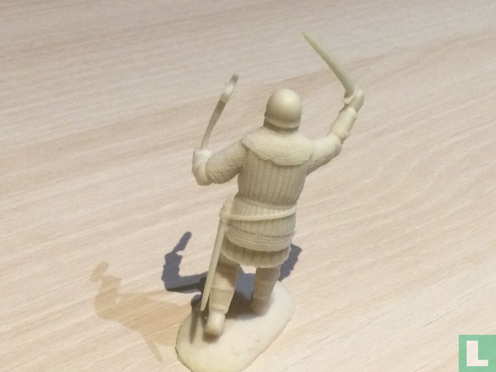 Armor with ax and sword