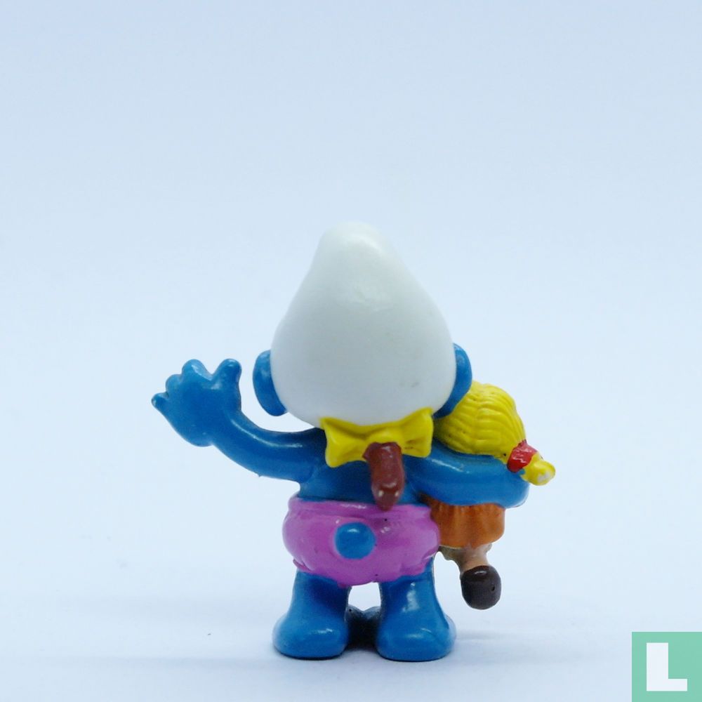 Bébé Schtroumpf avec poupée