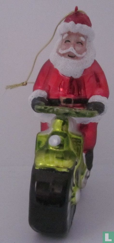 Kerstman op fiets