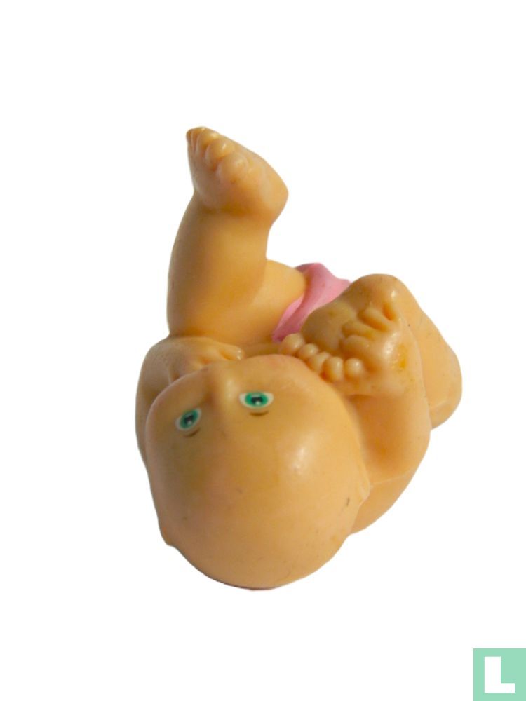 Cabbage Patch Kid lies on her back