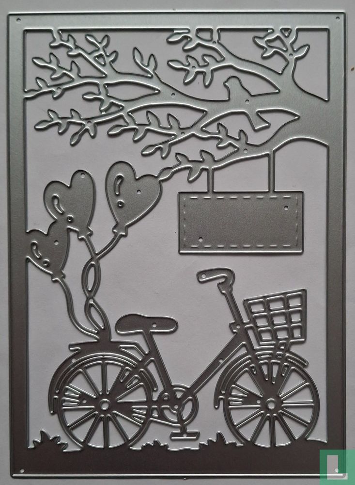 Damesfiets onder boom