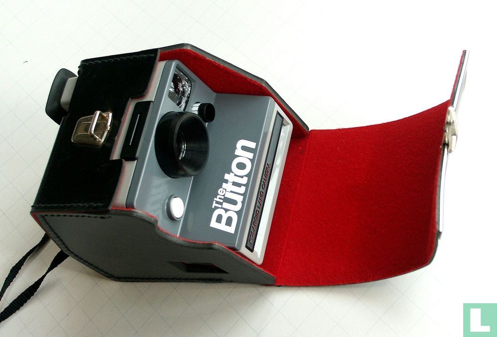 50 - SX-70 -THE BUTTON- (text front left)