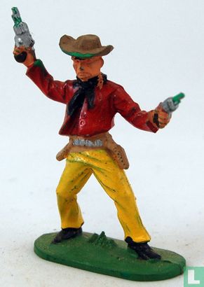Cowboy avec 2 revolvers tirant en l'air - Image 1