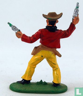 Cowboy avec 2 revolvers tirant en l'air - Image 2