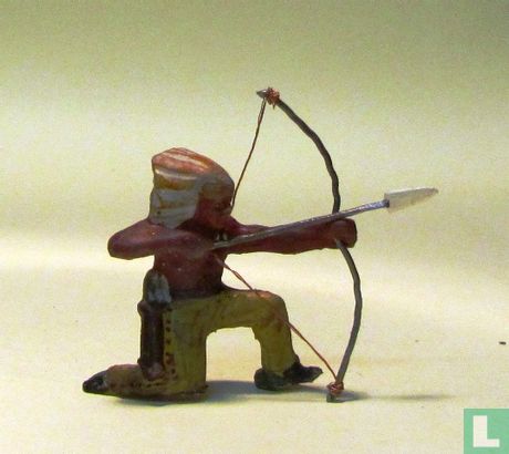 Indian kneeling with bow and arrow - Image 1