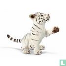Young white tiger playing