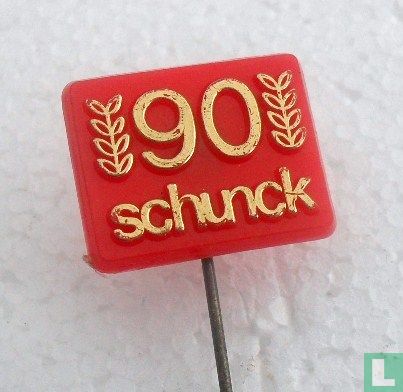 90 Schunck [goud op rood]