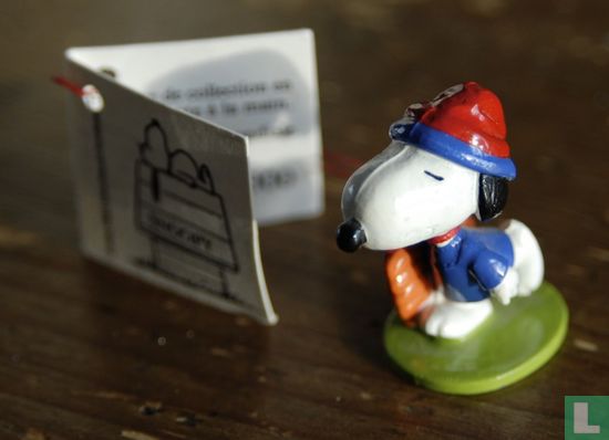 Snoopy with blue shirt and red and blue cap - Image 1