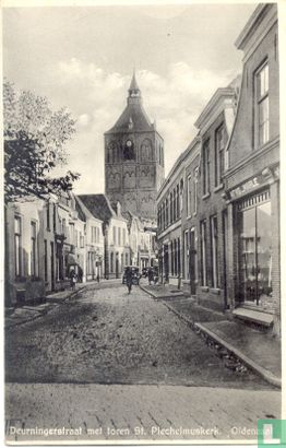 Deurningerstraat met toren St. Plechelmuskerk - Image 1