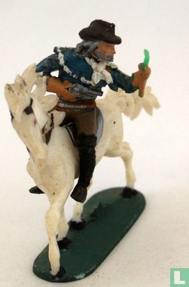 Cowboy met zweep en revolver te paard - Afbeelding 1