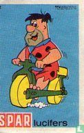 "Fred Flintstone op motor"