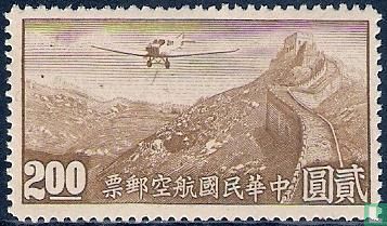 Vliegtuig boven Chinese Muur