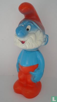 Papa Smurf with hands along body