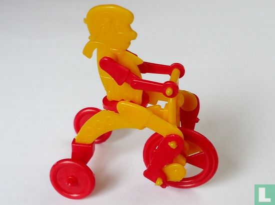 Man on tricycle