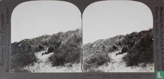Creeping on the enemy over the sand dunes, British contingent in Belgium.  - Image 1
