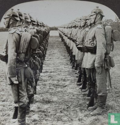 Helmeted German soldiers lined up for review. - Image 2