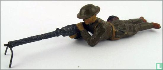 Soldier lying with machine gun - Image 1