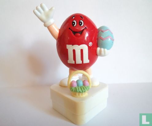 Red M&M with Easter egg and basket