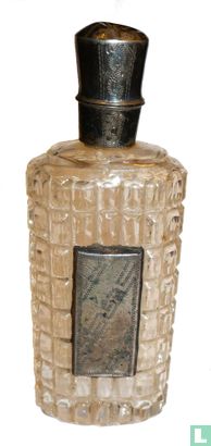 Antiek kristallen parfumflesje met zilveren dop