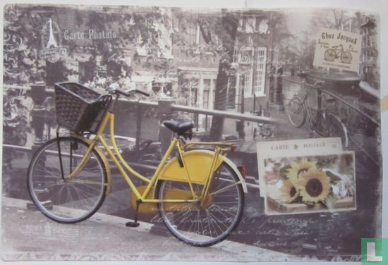 Gele fiets bij brugleuning