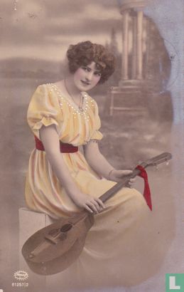 Jonge vrouw met mandoline - Image 1