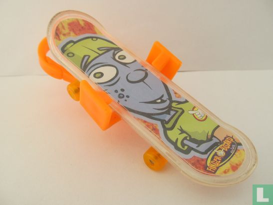 Toy skateboard with orange clip