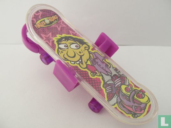 Toy skateboard with purple clip 