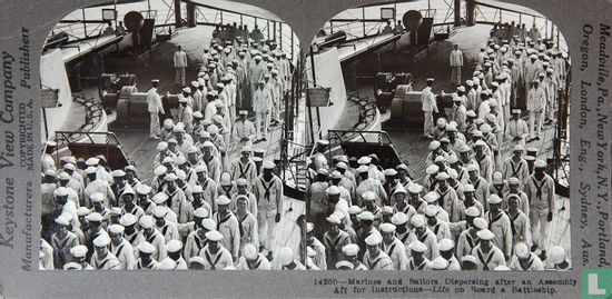 Marines and sailors dispersing after assembly aft for instructions - Image 1