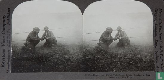 Repairing field telephone lines during a gas attack at the front - Image 1