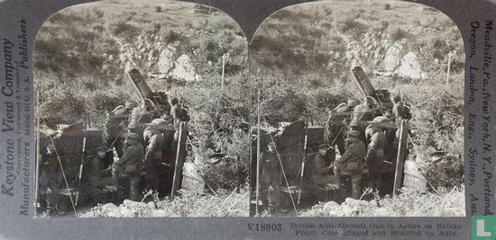A camouflaged British anti-aircraft gun in action on Balkan front - Image 1