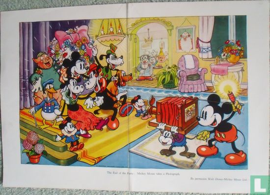 The end of the party: Mickey Mouse takes a phothograph 