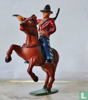 Cow-boy monté (pistolet sur le dos) - Image 1