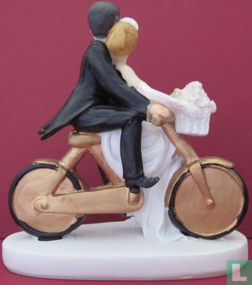 golden wedding couple on bike - Image 2