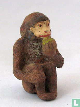 Singe Manger - Image 1