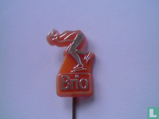 Brio (ice skater) [gold on orange] - Image 1