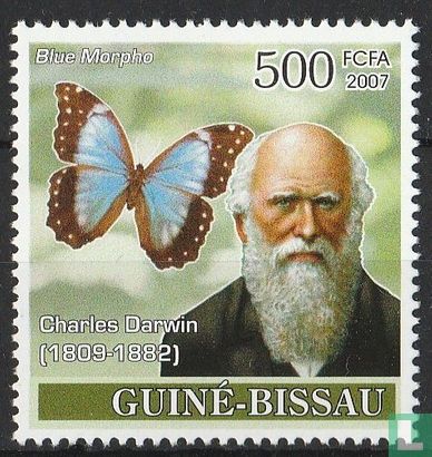 Charles Darwin avec un papillon morpho bleu