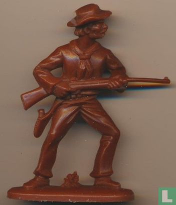 Cowboy with a gun at the ready (Brown) - Image 1