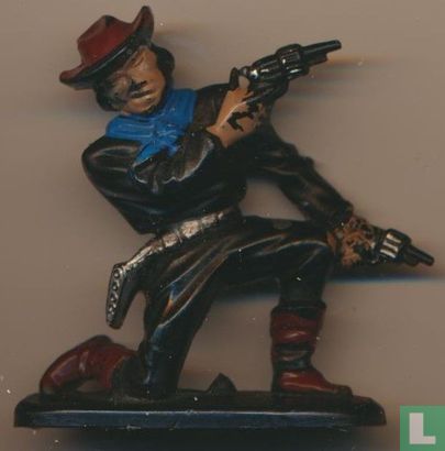 Cowboy kneeling with 2 revolvers (Black) - Image 1