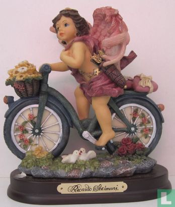 Pink angel on bicycle - Image 1