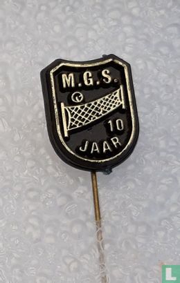 M.G.S. 10 jaar [goud op zwart]