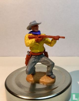 Cowboy geel met geweer  - Afbeelding 1
