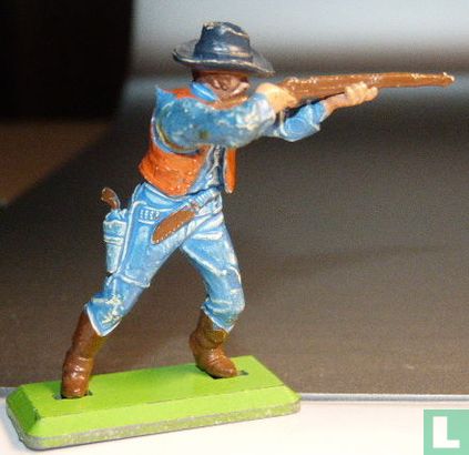 Cowboy à pied avec une arme à feu - Image 1