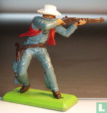 Cowboy on foot with rifle - Image 1