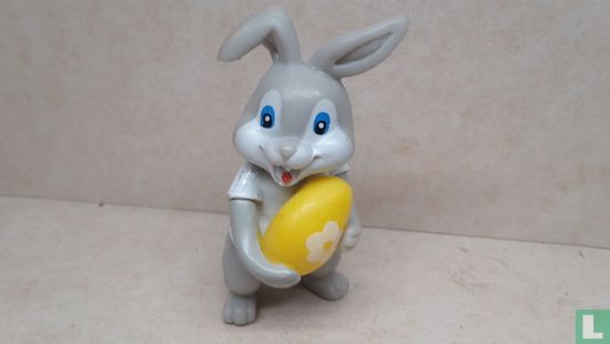 Gray Easter bunny with yellow egg - Image 1